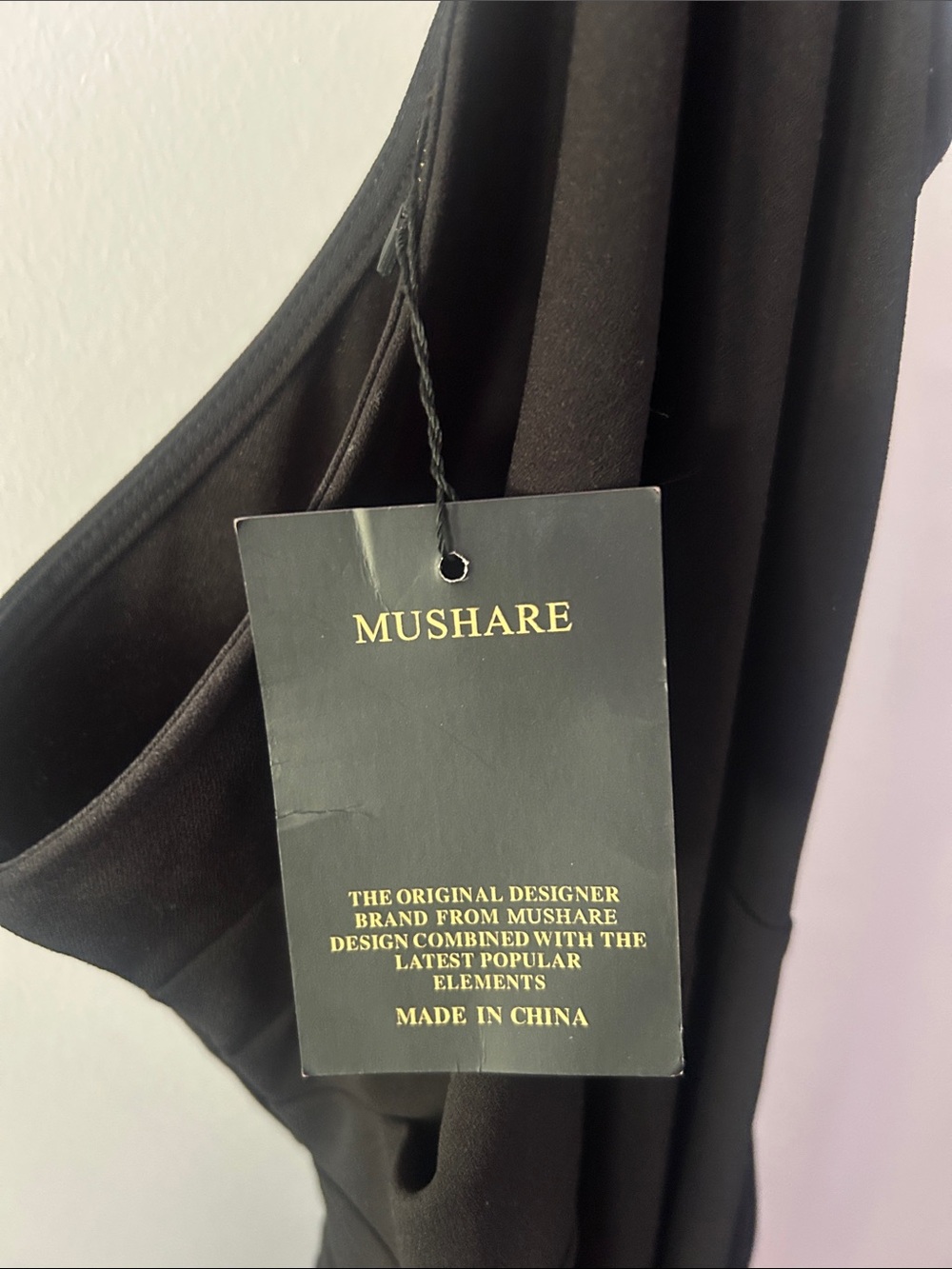 Mushare Black Dress with Gold-Logo Tag